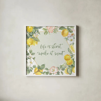 Citrus Charm II by Beth Grove. Shown in a crisp white glass frame for a clean and minimalist style. Available as an archival giclee rolled canvas, fine art paper, or poster print. SKU 65556a.