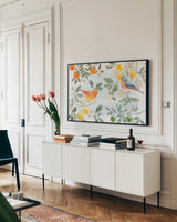 Citrus Wings I by Beth Grove. shown as a framed stretched canvas in a living room above a console. Available as a archival giclee rolled canvas, fine art paper, or poster print. SKU 97254i.
