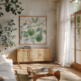 Citrus Wings VI by Beth Grove. Shown in a natural wood frame in a cozy modern living room. Available as an archival giclee rolled canvas, fine art paper, or poster print. SKU 97259a.