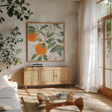 Citrus Wings VII by Beth Grove. Shown in a natural wood frame in a cozy modern living room. Available as an archival giclee rolled canvas, fine art paper, or poster print. SKU 97260a.