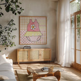 Coastal Baby VI by Beth Grove. Shown in a natural wood frame in a cozy modern living room. Available as an archival giclee rolled canvas, fine art paper, or poster print. SKU 29314a.