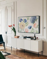 Coastline Botanical I by Beth Grove. shown as a framed stretched canvas in a living room above a console. Available as a archival giclee rolled canvas, fine art paper, or poster print. SKU 58548i.