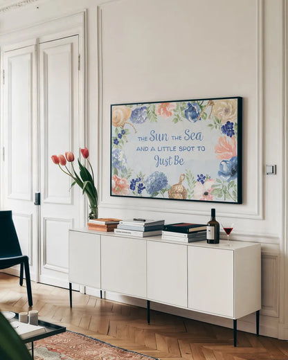 Coastline Botanical IV Blue by Beth Grove. shown as a framed stretched canvas in a living room above a console. Available as a archival giclee rolled canvas, fine art paper, or poster print. SKU 58559i.