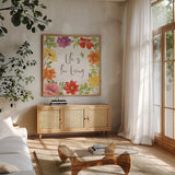 Farmhouse Floral II by Beth Grove. Shown in a natural wood frame in a cozy modern living room. Available as an archival giclee rolled canvas, fine art paper, or poster print. SKU 56720a.