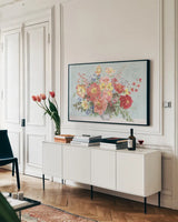 Floral Focus V Blue by Beth Grove. shown as a framed stretched canvas in a living room above a console. Available as a archival giclee rolled canvas, fine art paper, or poster print. SKU 62335i.