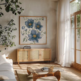 Floral Solitude VIII by Beth Grove. Shown in a natural wood frame in a cozy modern living room. Available as an archival giclee rolled canvas, fine art paper, or poster print. SKU 67784a.