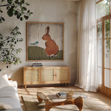 Gentle Critters III Summer by Beth Grove. Shown in a natural wood frame in a cozy modern living room. Available as an archival giclee rolled canvas, fine art paper, or poster print. SKU 44443a.