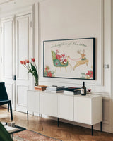 Holiday Traditions I Poinsettia by Beth Grove. shown as a framed stretched canvas in a living room above a console. Available as a archival giclee rolled canvas, fine art paper, or poster print. SKU 97640i.