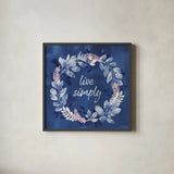 Indigo Petals IV by Beth Grove. Shown in a sleek black glass frame for a contemporary gallery look. Available as an archival giclee rolled canvas, fine art paper, or poster print. SKU 78056a.