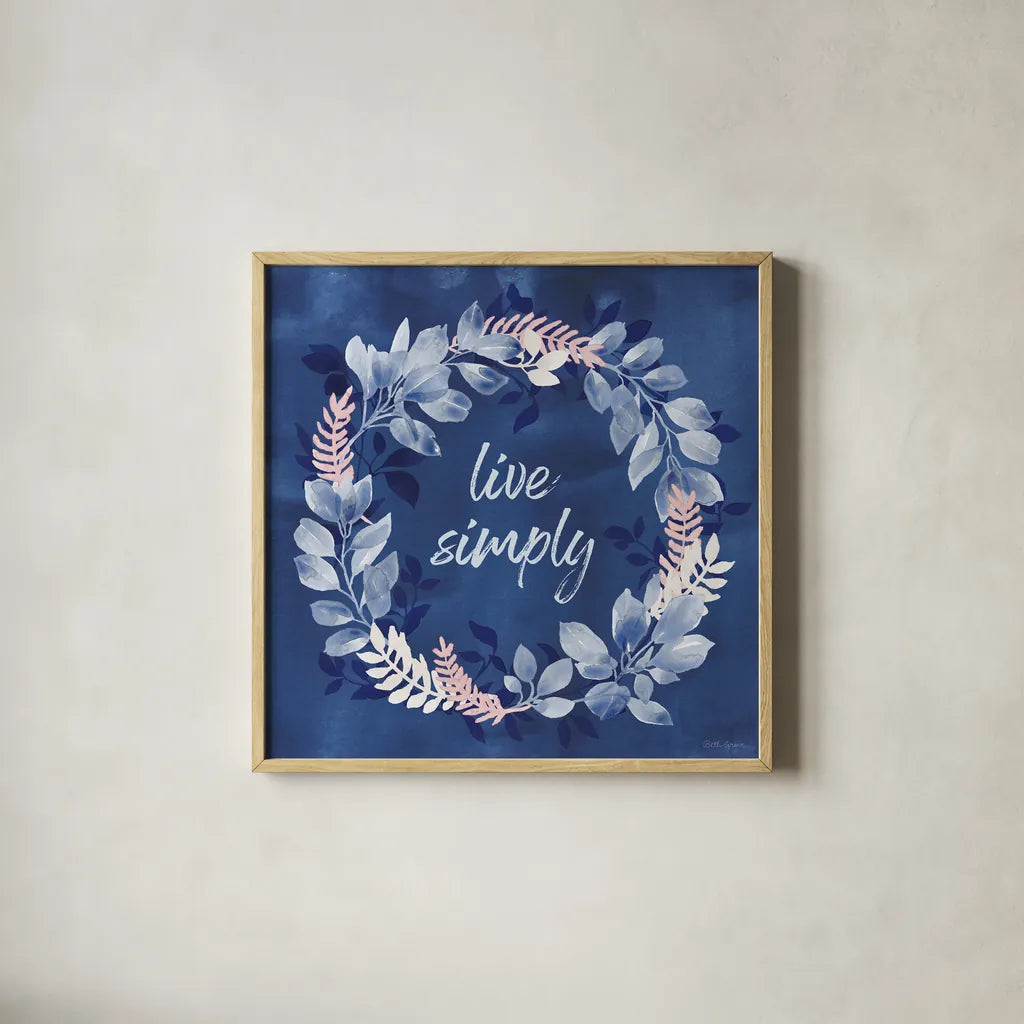 Indigo Petals IV by Beth Grove. Shown in a natural wood glass frame for a timeless modern aesthetic. Available as an archival giclee rolled canvas, fine art paper, or poster print. SKU 78056a.
