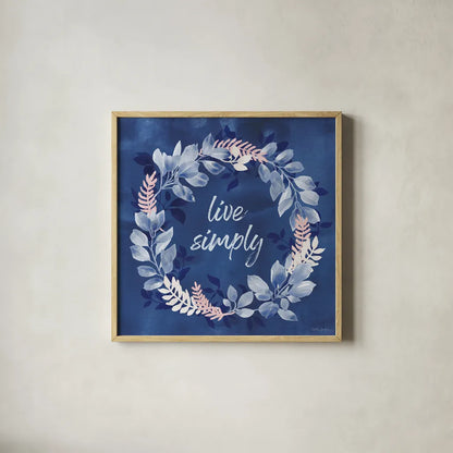 Indigo Petals IV by Beth Grove. Shown in a natural wood glass frame for a timeless modern aesthetic. Available as an archival giclee rolled canvas, fine art paper, or poster print. SKU 78056a.