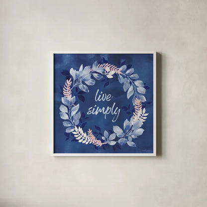 Indigo Petals IV by Beth Grove. Shown in a crisp white glass frame for a clean and minimalist style. Available as an archival giclee rolled canvas, fine art paper, or poster print. SKU 78056a.