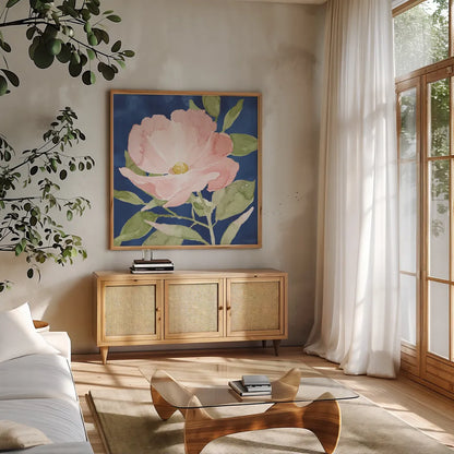 Indigo Petals IX by Beth Grove. Shown in a natural wood frame in a cozy modern living room. Available as an archival giclee rolled canvas, fine art paper, or poster print. SKU 78061a.