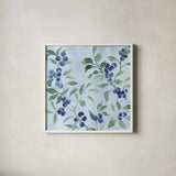 Indigo Petals VII by Beth Grove. Shown in a crisp white glass frame for a clean and minimalist style. Available as an archival giclee rolled canvas, fine art paper, or poster print. SKU 78059a.