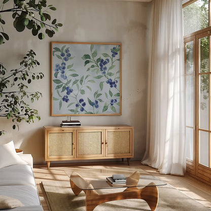 Indigo Petals VII by Beth Grove. Shown in a natural wood frame in a cozy modern living room. Available as an archival giclee rolled canvas, fine art paper, or poster print. SKU 78059a.