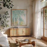 Natures Leaves II by Beth Grove. Shown in a natural wood frame in a cozy modern living room. Available as an archival giclee rolled canvas, fine art paper, or poster print. SKU 56070a.