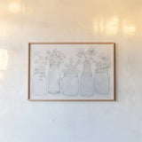 Peaceful Petals I Blue Gray by Beth Grove. shown as a paper print in a natural frame. Available as a archival giclee rolled canvas, fine art paper, or poster print. SKU 79199i.