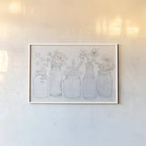 Peaceful Petals I Blue Gray by Beth Grove. shown as a paper print in a white frame. Available as a archival giclee rolled canvas, fine art paper, or poster print. SKU 79199i.