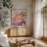 Petal Passion VIII by Beth Grove. Shown in a natural wood frame in a cozy modern living room. Available as an archival giclee rolled canvas, fine art paper, or poster print. SKU 70847a.