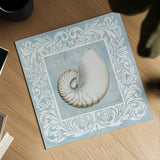 Sandy Shells Blue on Blue Nautilus by Beth Grove. Shown as a detailed flat fine art print, highlighting archival giclee quality. Available as an archival giclee rolled canvas, fine art paper, or poster print. SKU 12888a.