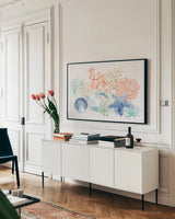 Seaside I by Beth Grove. shown as a framed stretched canvas in a living room above a console. Available as a archival giclee rolled canvas, fine art paper, or poster print. SKU 78684i.