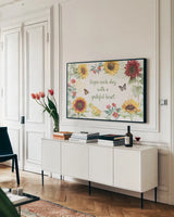 Sunflower Splendor I by Beth Grove. shown as a framed stretched canvas in a living room above a console. Available as a archival giclee rolled canvas, fine art paper, or poster print. SKU 65339i.