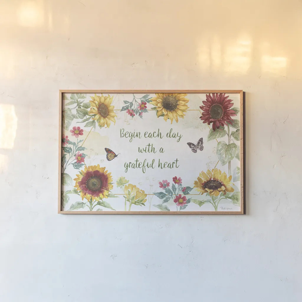 Sunflower Splendor I by Beth Grove. shown as a paper print in a natural frame. Available as a archival giclee rolled canvas, fine art paper, or poster print. SKU 65339i.