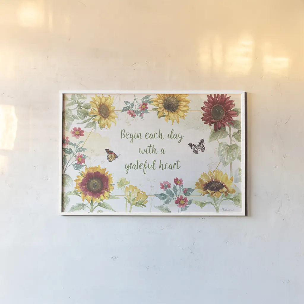 Sunflower Splendor I by Beth Grove. shown as a paper print in a white frame. Available as a archival giclee rolled canvas, fine art paper, or poster print. SKU 65339i.