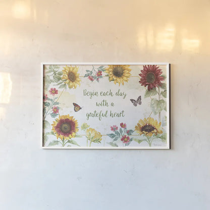 Sunflower Splendor I by Beth Grove. shown as a paper print in a white frame. Available as a archival giclee rolled canvas, fine art paper, or poster print. SKU 65339i.