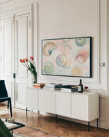 Watercolor Coast IV by Beth Grove. shown as a framed stretched canvas in a living room above a console. Available as a archival giclee rolled canvas, fine art paper, or poster print. SKU 47560i.
