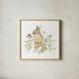 Wildflower Bunnies IV Sq by Beth Grove. Shown in a natural wood glass frame for a timeless modern aesthetic. Available as an archival giclee rolled canvas, fine art paper, or poster print. SKU 24702a.