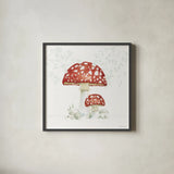 Woodland Love Red Mushroom by Beth Grove. Shown in a sleek black glass frame for a contemporary gallery look. Available as an archival giclee rolled canvas, fine art paper, or poster print. SKU 87841a.