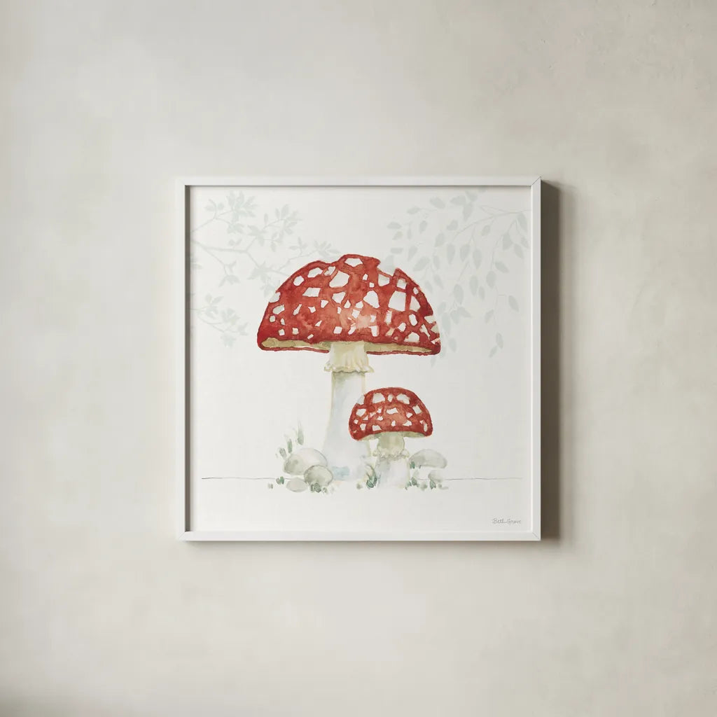 Woodland Love Red Mushroom by Beth Grove. Shown in a crisp white glass frame for a clean and minimalist style. Available as an archival giclee rolled canvas, fine art paper, or poster print. SKU 87841a.