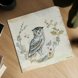Woodland Wreath IX Blue Feather by Beth Grove. Shown as a detailed flat fine art print, highlighting archival giclee quality. Available as an archival giclee rolled canvas, fine art paper, or poster print. SKU 89344a.