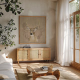 Woodland Wreath VIII on Burlap by Beth Grove. Shown in a natural wood frame in a cozy modern living room. Available as an archival giclee rolled canvas, fine art paper, or poster print. SKU 101480a.