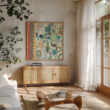 Raining Flowers II by Candra Boggs. Shown in a natural wood frame in a cozy modern living room. Available as an archival giclee rolled canvas, fine art paper, or poster print. SKU 22632a.