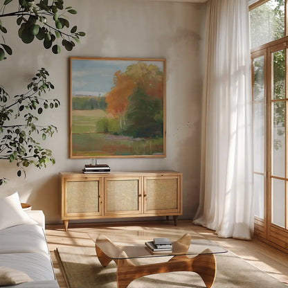 Abstract Field II  Bright Blue Sky by Carol Rowan. Shown in a natural wood frame in a cozy modern living room. Available as an archival giclee rolled canvas, fine art paper, or poster print. SKU 42304a.