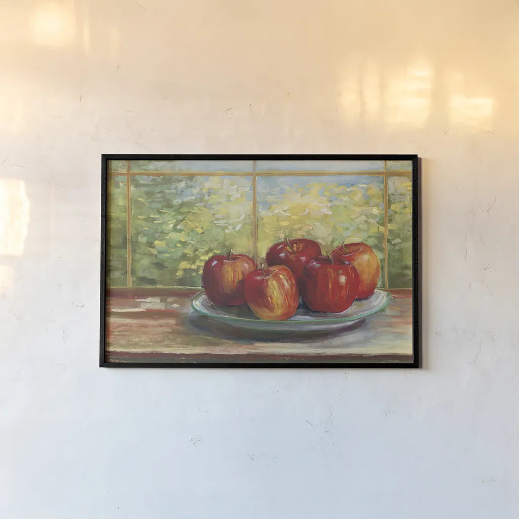 Apples on Windowsill by Carol Rowan. shown as a paper print in a black flame. Available as a archival giclee rolled canvas, fine art paper, or poster print. SKU 99970i.