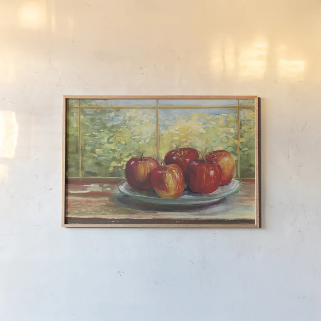 Apples on Windowsill by Carol Rowan. shown as a paper print in a natural frame. Available as a archival giclee rolled canvas, fine art paper, or poster print. SKU 99970i.