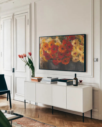 Chelsea Gerberas Grey by Carol Rowan. shown as a framed stretched canvas in a living room above a console. Available as a archival giclee rolled canvas, fine art paper, or poster print. SKU 41566i.