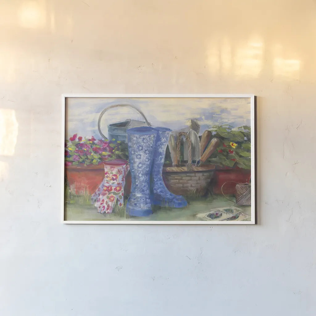 Gardeners Still Life with Boots by Carol Rowan. shown as a paper print in a white frame. Available as a archival giclee rolled canvas, fine art paper, or poster print. SKU 27739i.