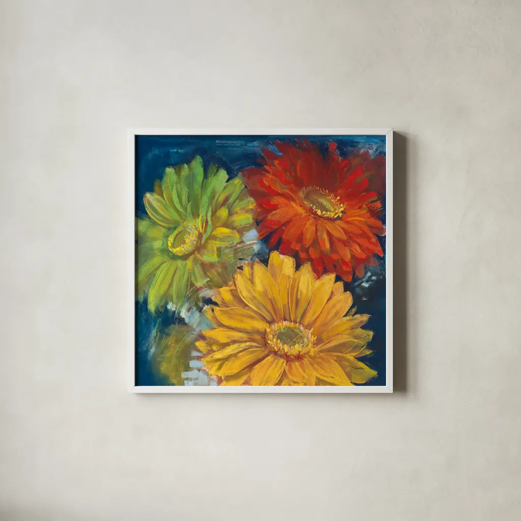 Gerbera Glow I by Carol Rowan. Shown in a crisp white glass frame for a clean and minimalist style. Available as an archival giclee rolled canvas, fine art paper, or poster print. SKU 41935a.