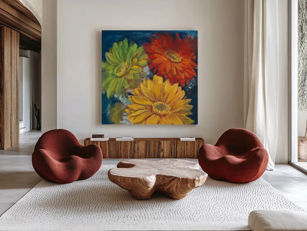 Gerbera Glow I by Carol Rowan. Shown as extra-large giant wall art in a modern living room. Available as an archival giclee rolled canvas, fine art paper, or poster print. SKU 41935a.