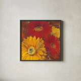 Gerbera Glow II Spice by Carol Rowan. Shown in a sleek black glass frame for a contemporary gallery look. Available as an archival giclee rolled canvas, fine art paper, or poster print. SKU 41937a.
