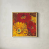 Gerbera Glow II Spice by Carol Rowan. Shown in a natural wood glass frame for a timeless modern aesthetic. Available as an archival giclee rolled canvas, fine art paper, or poster print. SKU 41937a.