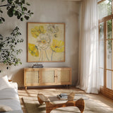Gold and White Contemporary Poppies I by Carol Rowan. Shown in a natural wood frame in a cozy modern living room. Available as an archival giclee rolled canvas, fine art paper, or poster print. SKU 11253a.