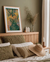 Grasses in Green Vase by Carol Rowan. shown as a paper print in a natural frame. Available as a archival giclee rolled canvas, fine art paper, or poster print. SKU 7935h.