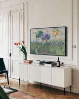Green Chair with Hydrangea by Carol Rowan. shown as a framed stretched canvas in a living room above a console. Available as a archival giclee rolled canvas, fine art paper, or poster print. SKU 42299i.