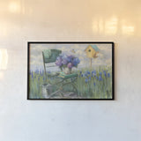Green Chair with Hydrangea by Carol Rowan. shown as a paper print in a black flame. Available as a archival giclee rolled canvas, fine art paper, or poster print. SKU 42299i.