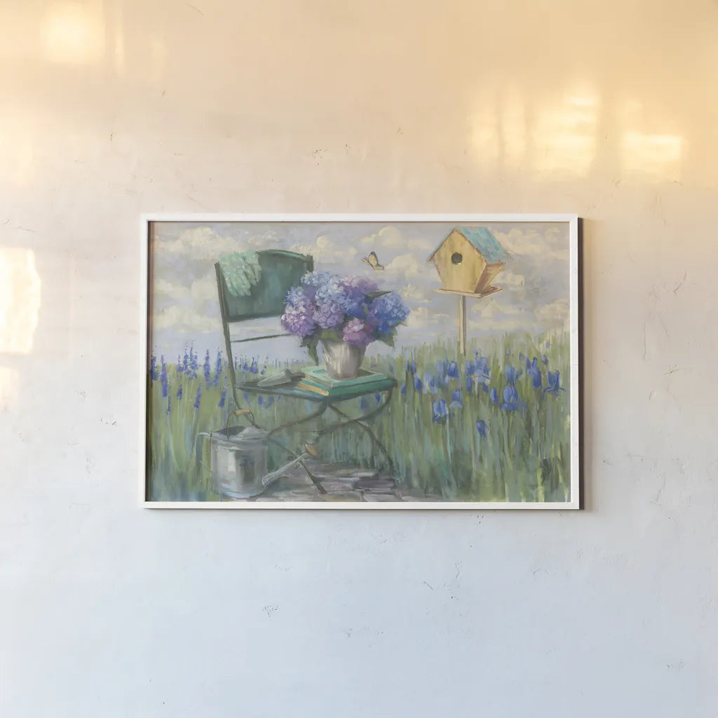 Green Chair with Hydrangea by Carol Rowan. shown as a paper print in a white frame. Available as a archival giclee rolled canvas, fine art paper, or poster print. SKU 42299i.